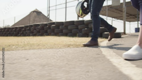 Wallpaper Mural People walking onto race track Torontodigital.ca