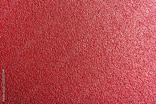 matte grungy sandpaper background closeup photo