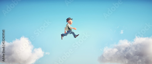 Man jumps on a cloud on another cloud. The concept of promotion.