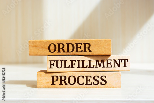 Wooden blocks with words 'Order Fulfillment Process'. Business concept