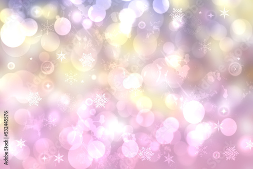 A festive abstract delicate Happy New Year or Christmas background texture with colorful pink and light violet blurred bokeh lights and stars. Space for design. Card concept or advertising.