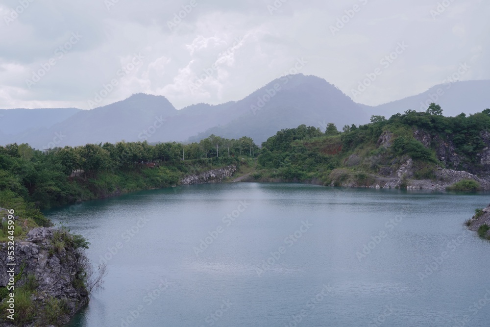 The limestone mountains after the concession explosion during the rainy season form a large and beautiful pond.