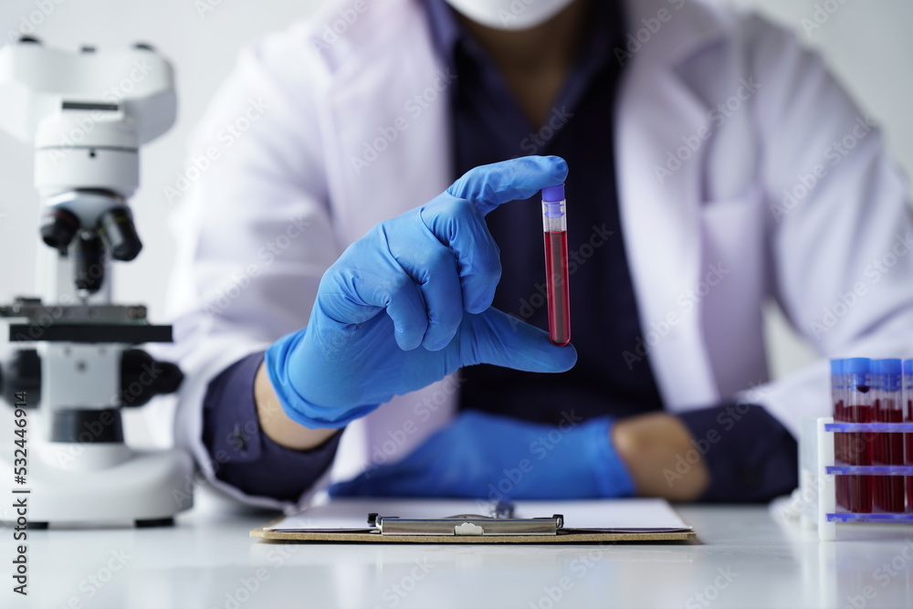 Lab worker preparing test blood for detection of antibodies and infections Corona virus.
