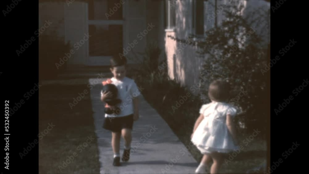 Leaving With Mom 1962 - Siblings leave their house with their mother in Canoga Park, California in 1962.
