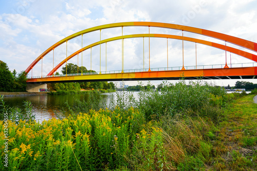 Bridge Dattelner Meerbogen near Datteln on the canal. Arched bridge in bright colors on the Dattelner Meer.  © Elly Miller