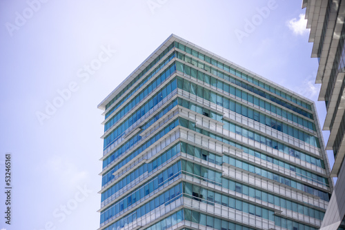Urban abstract background, detail of modern glass facade, office business building at Taipei city, Taiwan