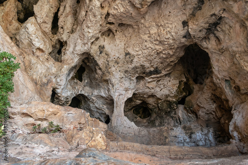 The cave  in which the primitive man lived in the national reserve - Nahal Mearot Nature Preserve, near Haifa, in northern Israel photo