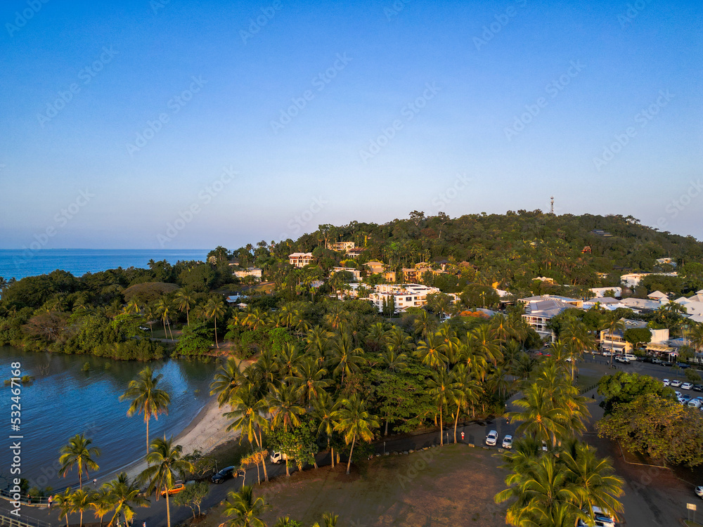 Aerial view of port douglas town, mountains and palm trees