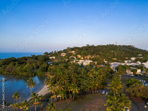 Aerial view of port douglas town, mountains and palm trees