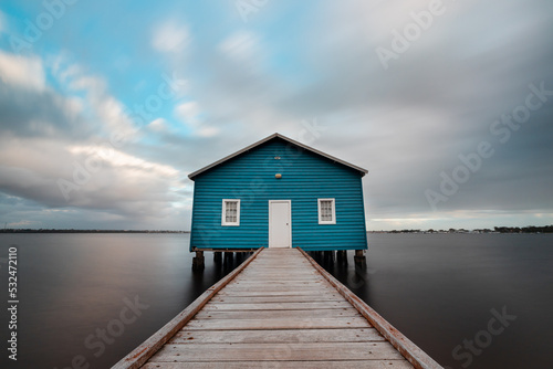 Long exposure shot of blue boat house in Perth, Western Australia