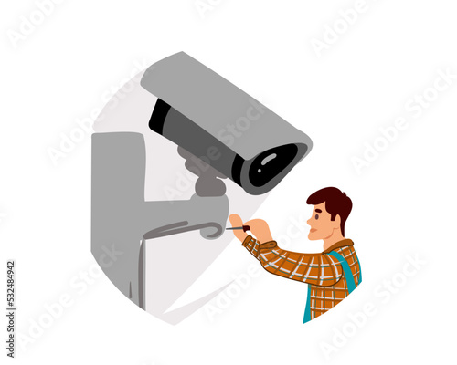  A worker installs a camera on the street CCTV Installation Wizard. Video surveillance master. CCTV camera installation service. Electrician with a screwdriver repairing a CCTV camera indoors.