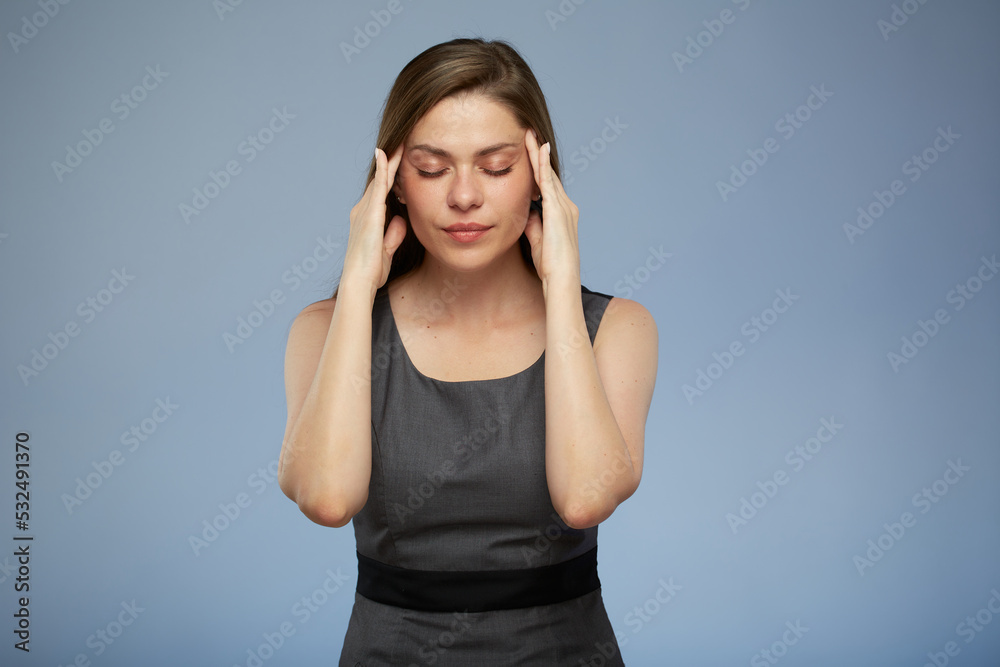 Business woman with headache isolated female portrait with eyes closed on blue. Business woman with headache isolated female portrait with eyes closed on blue.