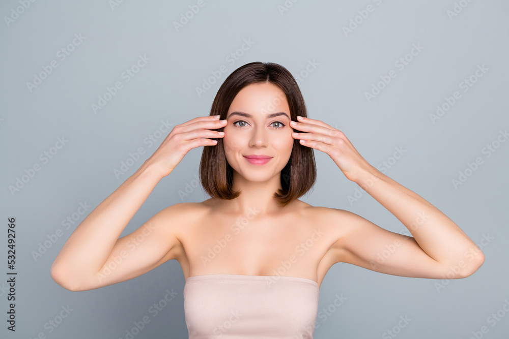 Photo of aesthetic lady touch eyebrows enjoy silky soft fresh pure face isolated over grey color background Photo of aesthetic lady touch eyebrows enjoy silky soft fresh pure face isolated over grey color background
