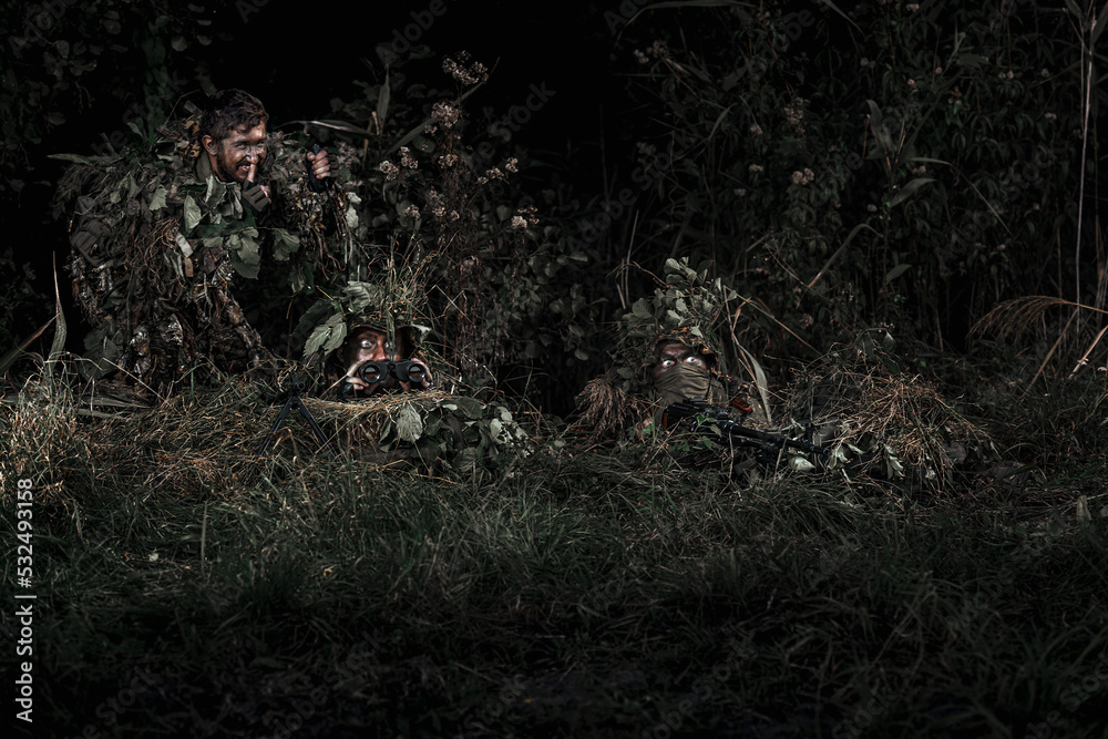 Eastern special forces soldier with rifle in woodland Stock Photo ...