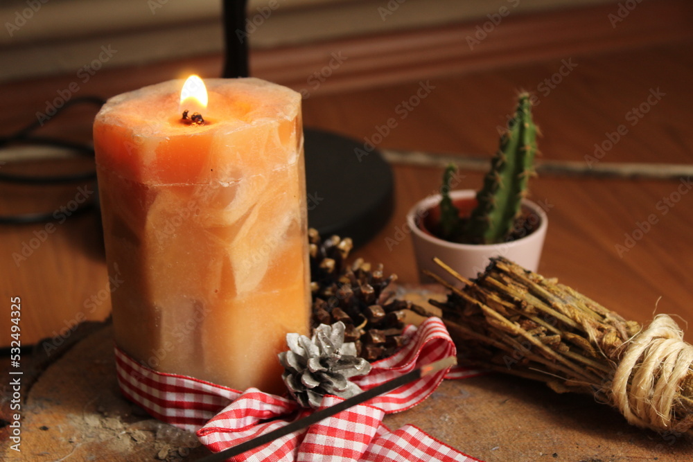 incense and a candle concept in a room incense and a candle concept in a room