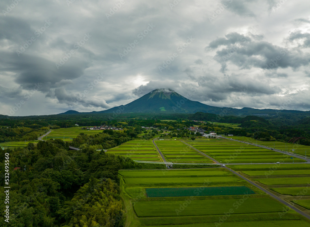 Fototapeta premium Terraced rice fields at the food of Mt. Daisen in Tottori, Japan on cloudy day