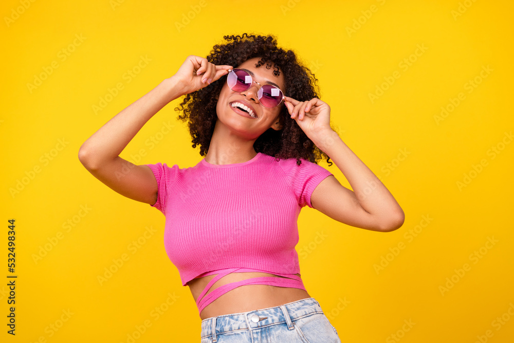 Photo of cool brunette lady wear glasses pink t-shirt isolated on vibrant orange color background