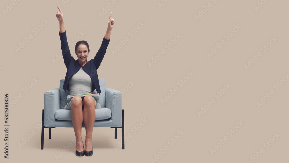 Cheerful businesswoman in the waiting room Cheerful businesswoman in the waiting room