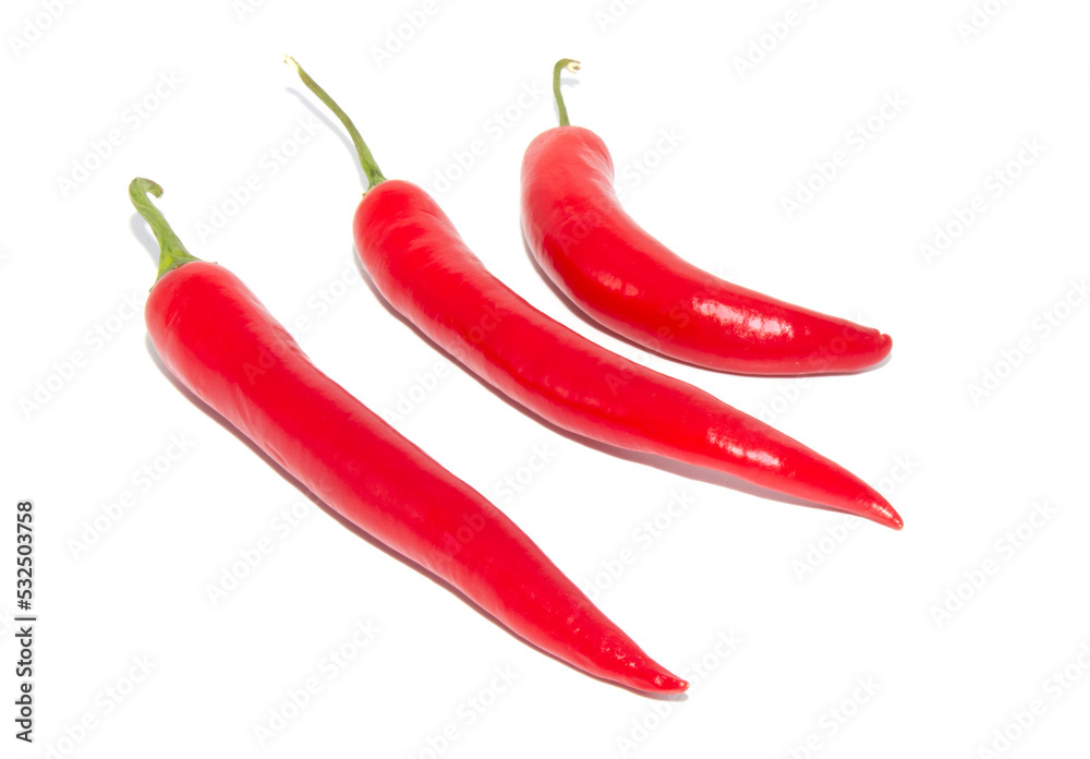 Red fresh chillies on a white background