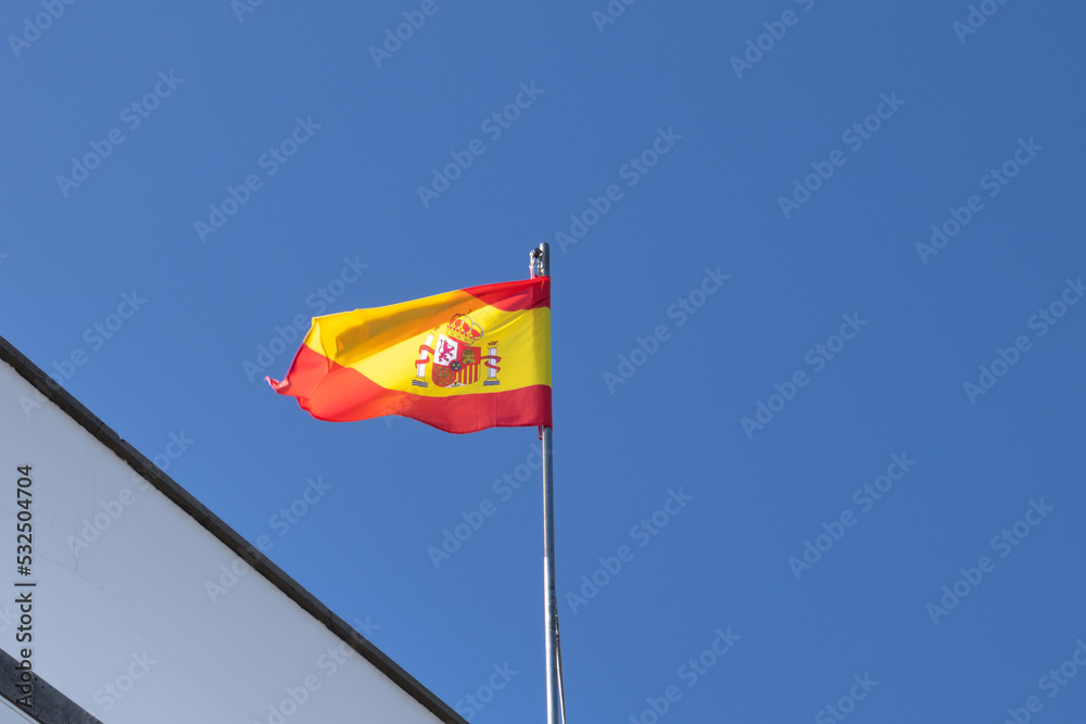 Spanish flag blowing in the wind Spanish flag blowing in the wind