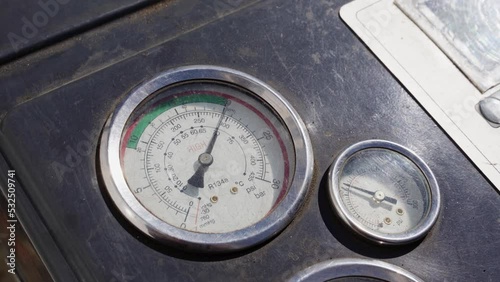 round gauges on the device showing pressure. pointer gauges photo