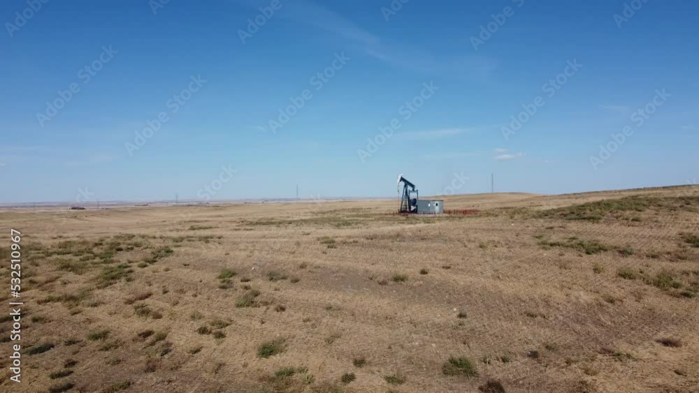 Aerial shot of pump jacks in rural Alberta oil fields. Aerial shot of pump jacks in rural Alberta oil fields.