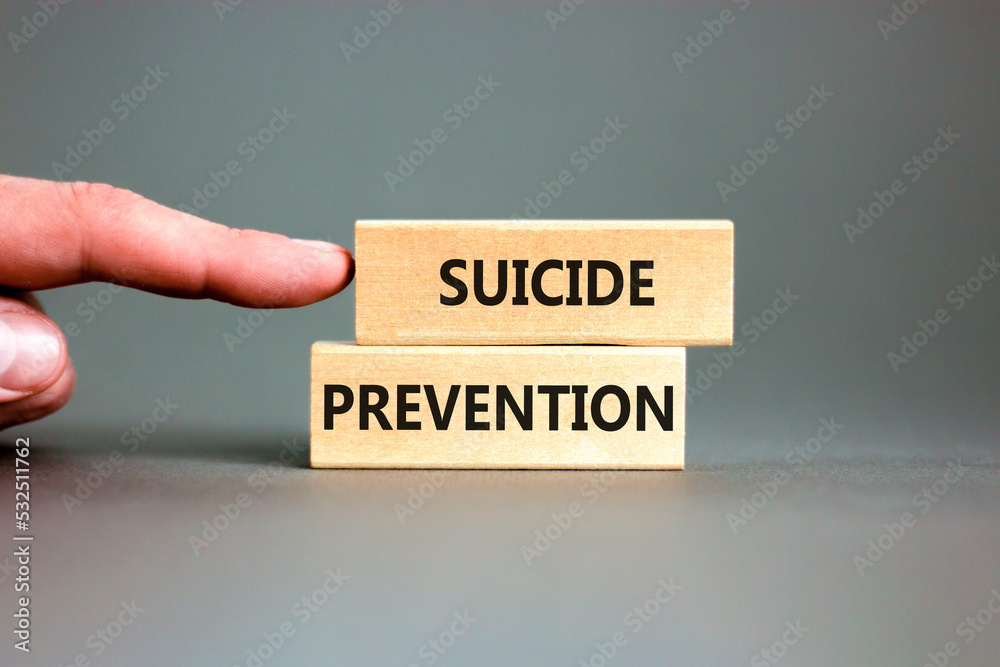 Suicide prevention symbol. Concept words Suicide prevention on wooden ...