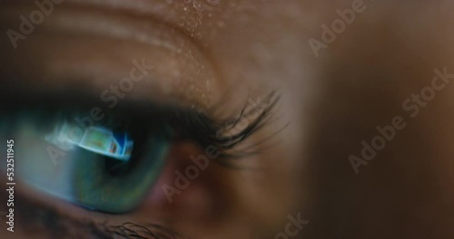 Eye reflection of woman doing web, internet or social media search on online network site, webpage or website closeup. Seo worker or employee working on digital design layout for global media company photo