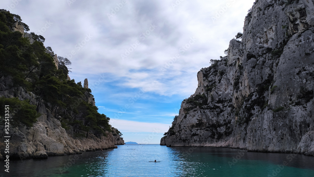 The Calanques National Park is a French national park located on the Mediterranean coast in Bouches-du-Rhône, Southern France. The beach of En-Vau and it's high limestone cliffs near Cassis.