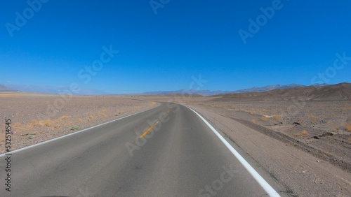 Drive through Death Valley National Park in California, USA. Desert road in Death Valley.