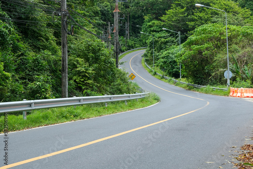 Empty highway in the rainforest mountains at Phuket, Thailand. No people and car © imihcioglu