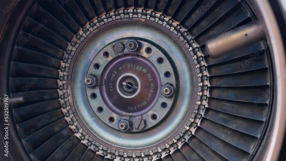 Aircraft engine turbine blades made of heat-resistant steel close-up. Gas turbine engine in industry and aviation. Turbine blades of an engine with a combustion chamber. The concept of the mechanism. Aircraft engine turbine blades made of heat-resistant steel close-up. Gas turbine engine in industry and aviation. Turbine blades of an engine with a combustion chamber. The concept of the mechanism.
