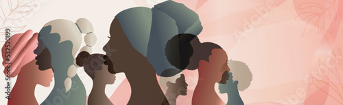 Profile silhouette group of African American or African women and girls. Heads and faces of black women. Female social community. Racial equality. Allyship. Empowerment. Banner copy space