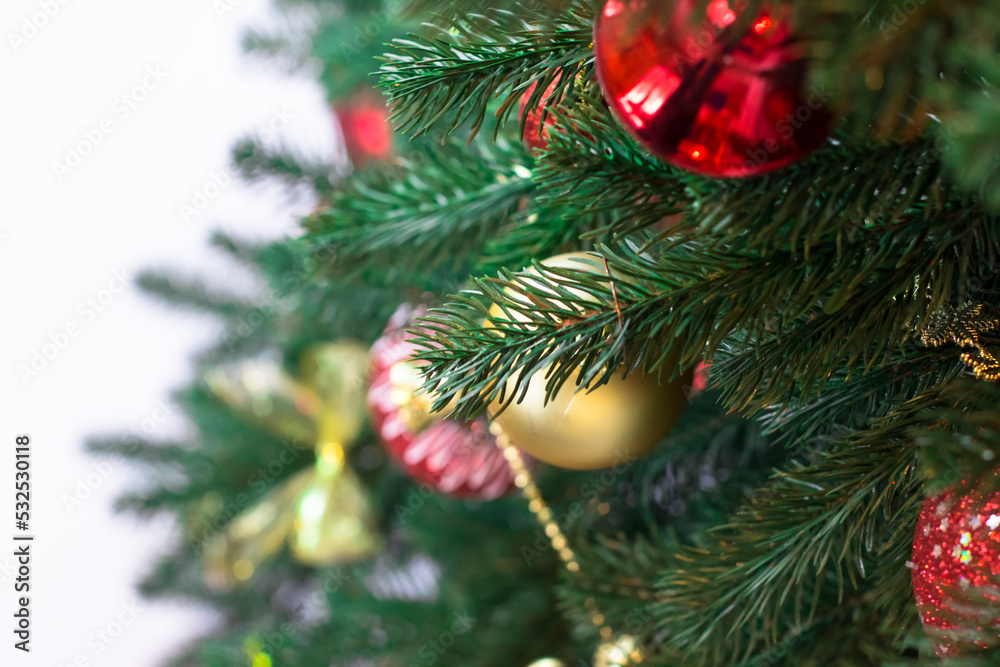 New Year's card. Christmas tree decorated with gold and red balls. Top view New Year's card. Christmas tree decorated with gold and red balls. Top view
