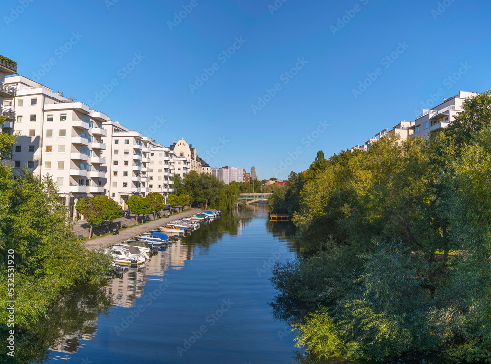 Fototapeta premium Apartment houses at the canal Karlbergskanalen a sunny autumn day in Stockholm