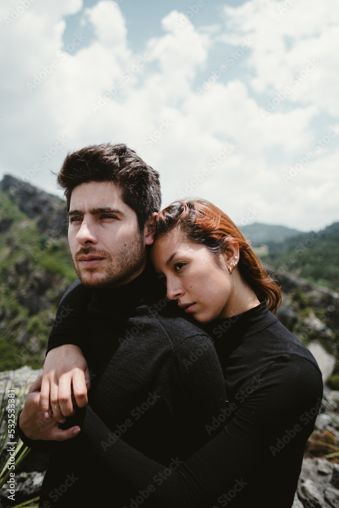 a couple contemplating the natural view a couple contemplating the natural view