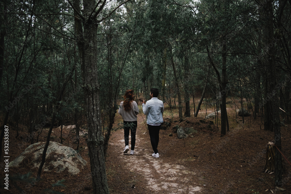 Romantic Couple In Love Walking In The woods Romantic Couple In Love Walking In The woods