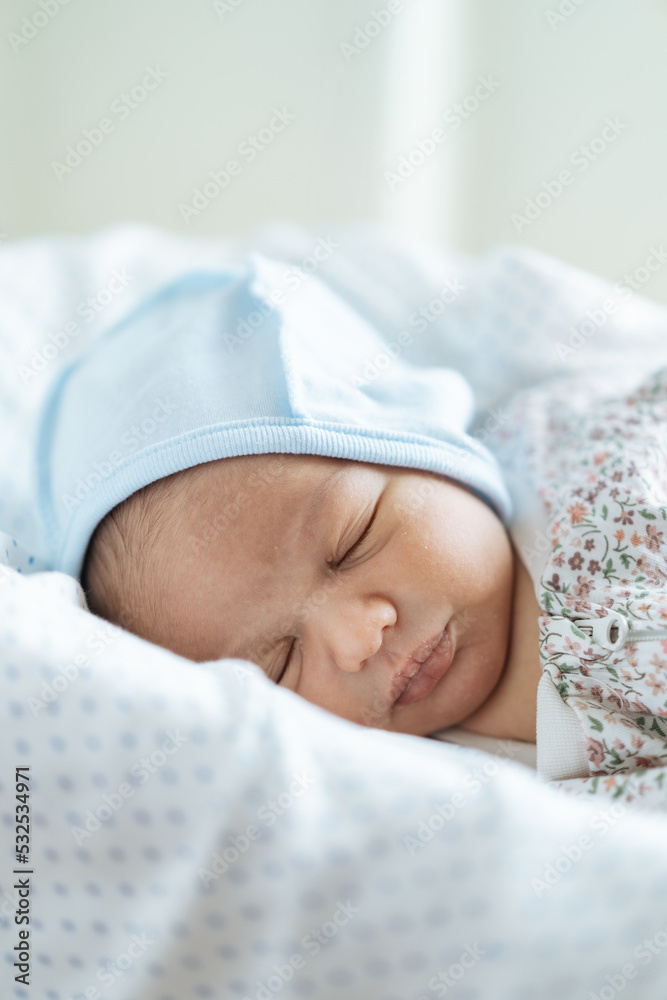 Newborn baby in his bed at home Newborn baby in his bed at home