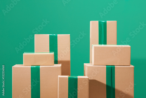 Lots of cardboard boxes on a color background  photo