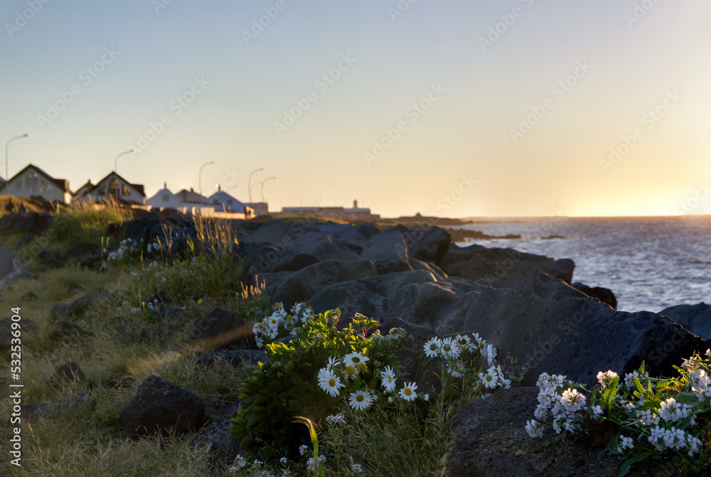 sunset at the ocean coast of reykjavik