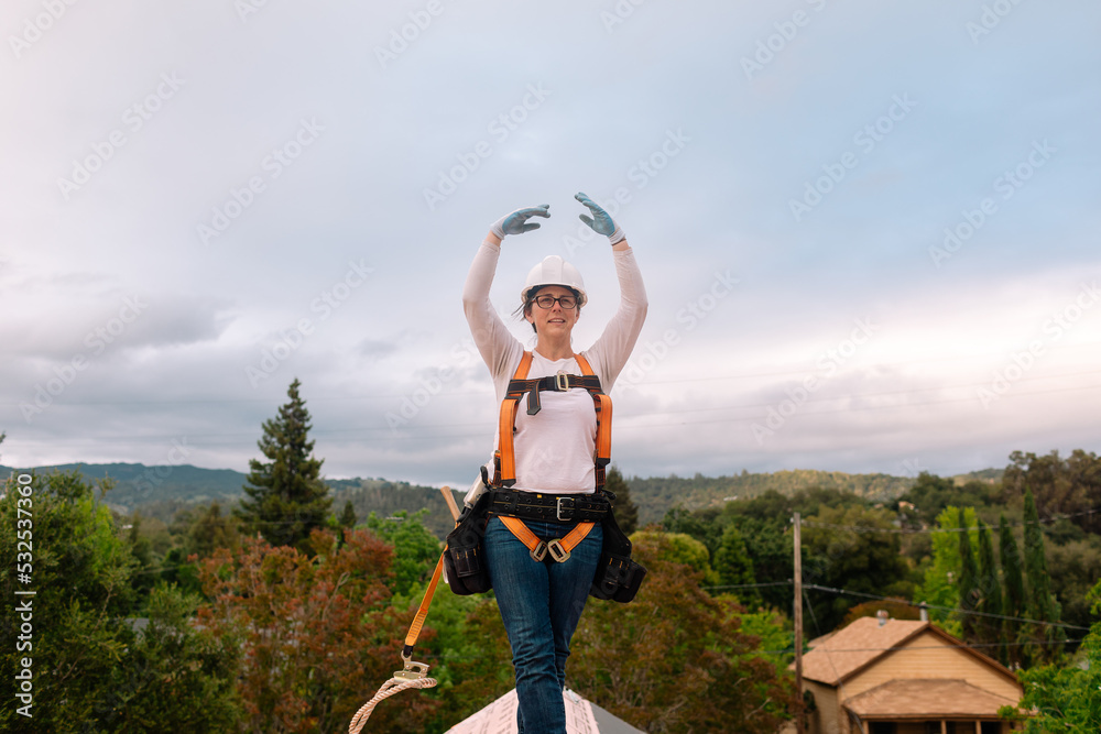 © ByLorena/Stocksy - Worker Woman on top roof by beautiful views © ByLorena/Stocksy - Worker Woman on top roof by beautiful views