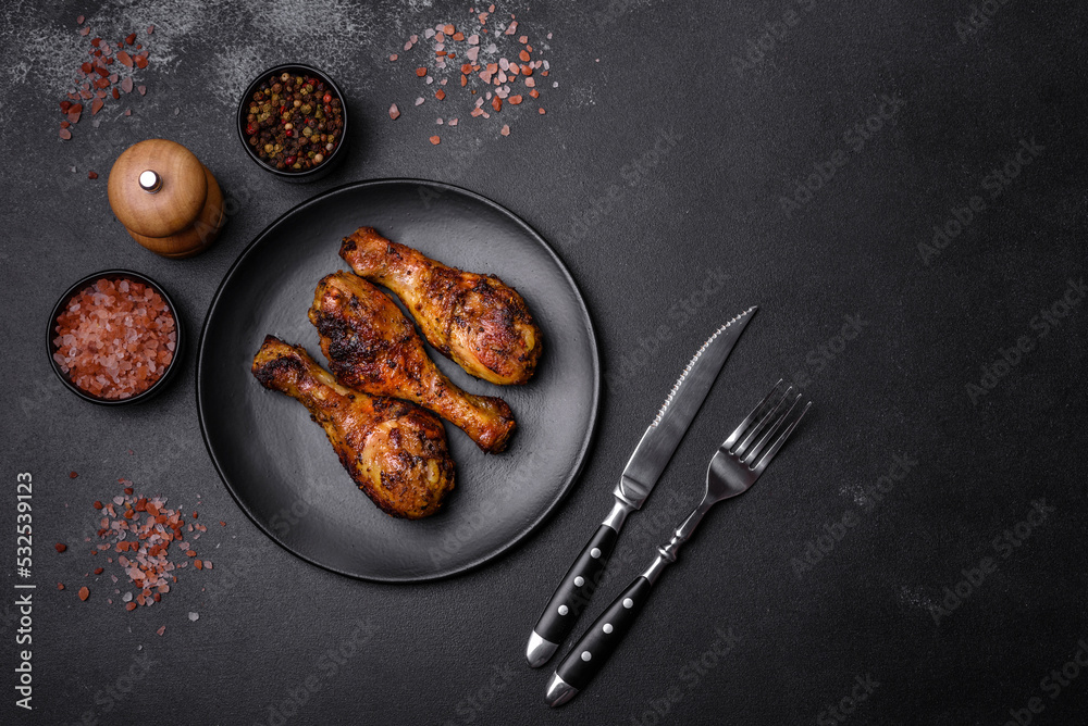 Delicious ruddy grilled chicken legs with spices and herbs Delicious ruddy grilled chicken legs with spices and herbs