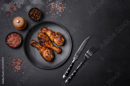 Delicious ruddy grilled chicken legs with spices and herbs