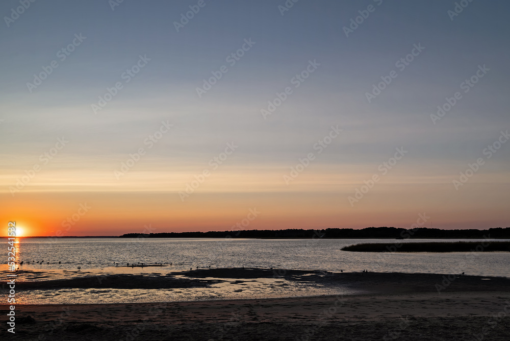 Late summer sunset over a cove at Chincoteague National Wildlife refuge. 