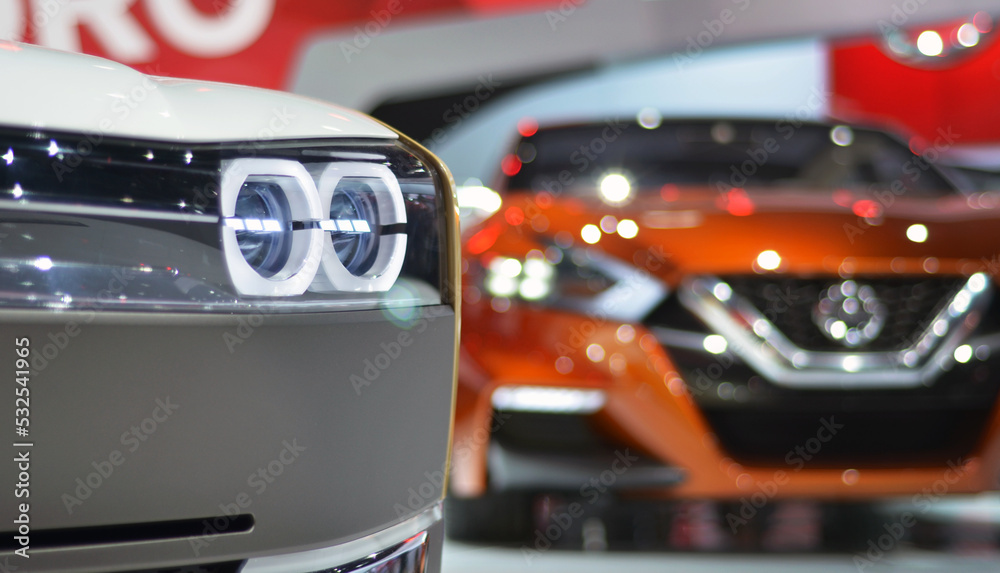 Obraz premium car headlight new and future- current and future 