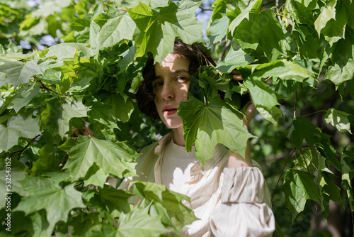 girl posing in the leaves
 photo