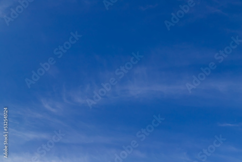 Blue sky cirrus clouds.