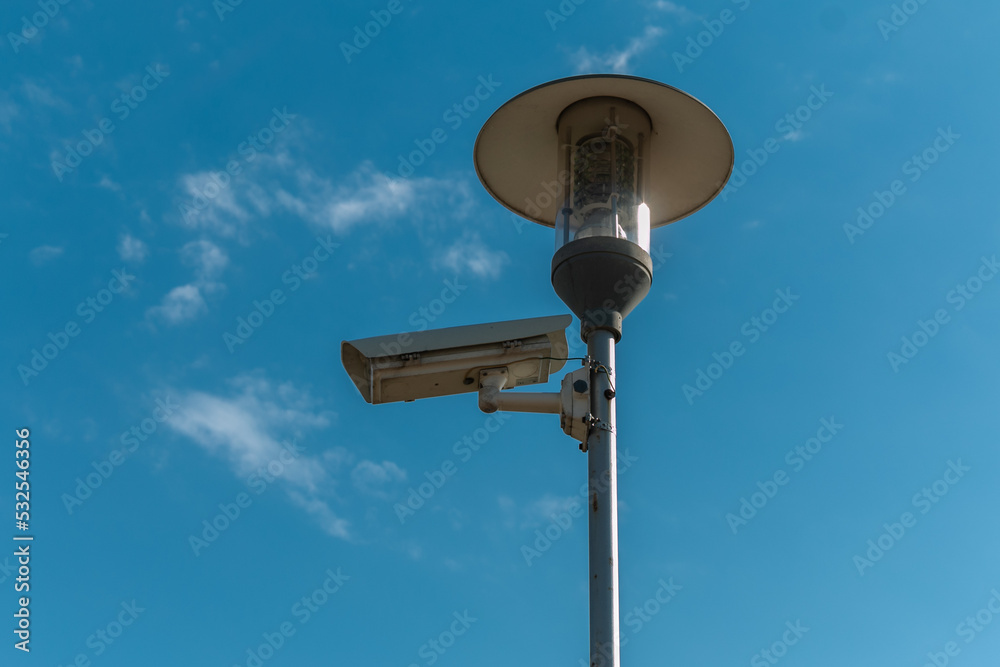 CCTV Cameras against the blue sky. Designed for visual control or automatic image analysis (automatic face recognition). Close-up. CCTV Cameras against the blue sky. Designed for visual control or automatic image analysis (automatic face recognition). Close-up.