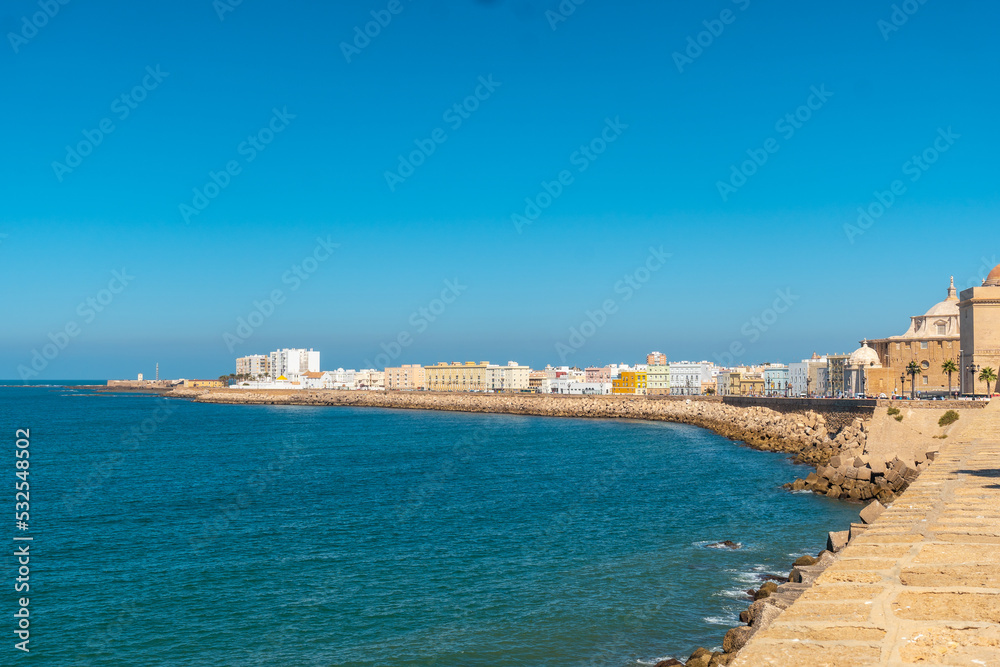 Beautiful coast of the tourist city of Cadiz in Andalusia, tourism in summer