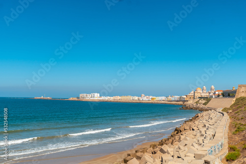 Beautiful coast of the tourist city of Cadiz in Andalusia, tourism in summer